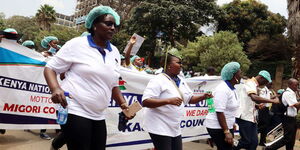 Nurses protest outside Afya House in Nairobi during a nationwide strike on September 11, 2017.