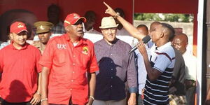 Nyali MP Mohammed Ali (right) with President Uhuru Kenyatta at a past event.