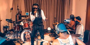 Nyashinski pictured performing from home in a show that was streamed on April 8, 2020