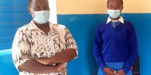 Diana Nyokabi (R) and her mother Priscilla Nyanchera at the Bungoma D.E.B Primary School.