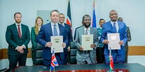 From left, UK Foreign Affairs Secretary James Cleverly, Kisumu County governor Anyang' Nyong'o and Trade CS Moses Kuria during the signing of United Green Project at State House, Nairobi on December 7