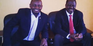 ODM National Youth Coordinator Benson Musungu with former Prime Minister Raila Odinga.