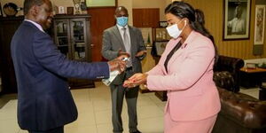 ODM leader Raila Odinga and Laikipia Woman Rep Cate Waruguru at Capitol Hill on Tuesday, June 9