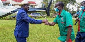 ODM leader Raila Odinga and Nominated MP Wilson Sossion during a party in Bomet on Saturday, September 19.