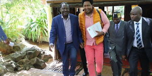 ODM party leader Raila Odinga (l) and Narok Senator Ledama ole Kina walk out of the delegates conference held in Narok on Friday, February 21, 2020.