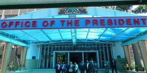 President Uhuru Kenyatta gives an address in front of Harambee House in Nairobi CBD.