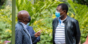 KANU Party Leader Gideon Moi chatting with FORD-Kenya Party Leader Moses Wetangula ​at Hermosa Gardens in Karen on Tuesday, July 20, 2021.