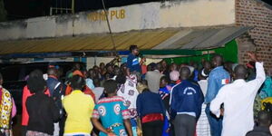 Siaya Governor James Orengo commissioning a Light mast at Ugenya market centre on Sunday, October 16, 2022