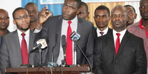 KMPDU secretary-general Dr. Ouma Oluga (centre) addresses journalists in 2017.