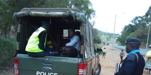 Police car during a crackdown on PSVs Non-compliant to covid-19