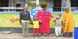 Parents Khali Ibrahim (right) and Caroline Kemunto renite with their children who had been lost for a year.