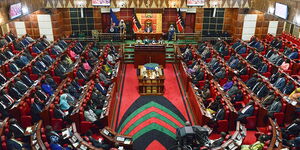Lawmakers seated in Parliament