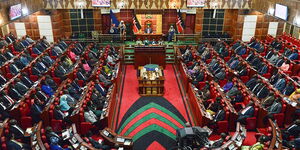 Lawmakers seated in Parliament