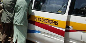Passengers boarding a matatu