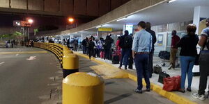 Passengers pictured at the Jomo Kenyatta International Airport (JKIA) following a disruption on March 6, 2019
