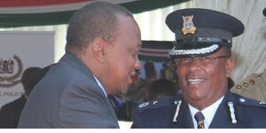 President Uhuru Kenyatta with former Presidential Escort SSP Patrick Wachira Mathenge