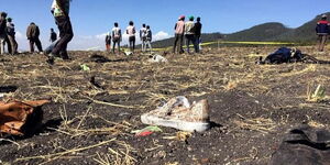 People at the Ethiopian Airlines crash site in Ethiopia