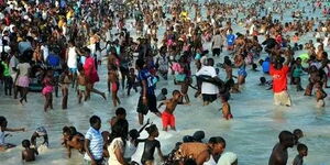 Kenyans swimming and others enjoying at Pirates Public beach in Mombasa on Sunday December 25, 2022