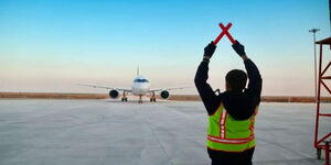 A plane on a runway before taking off 