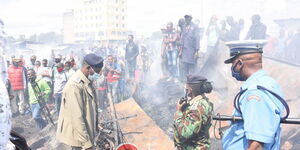 Police Officers pictured at Gikomba Market on June 25, 2020. President Uhuru Kenyatta has vowed to unmasks the suspected arsonists behind the frequent fires at the market.