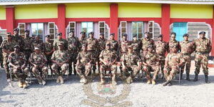 The Inspector General of Police,  Japhet Koome with officers based at NPS Border Police Unit (BPU) in Kanyonyo, Kitui County on February 8, 2023