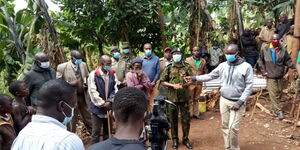 Police officers at Henry Nyabuto's home in Kisii.