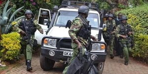 Police officers at a scene in a previous incident