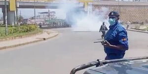 Police lob tear gas to disperse rowdy crowds in Kondele, Kisumu County on November 10, 2021