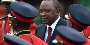 President Uhuru Kenyatta inspects a guard of honour during Mashujaa Day celebrations on October 20, 2017