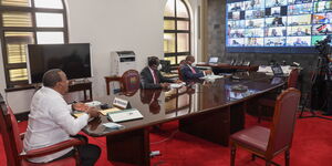 President Uhuru Kenyatta (Left)  Council of Governors Chairman Wycliffe Oparanya and Health CS Mutahi Kagwe pictured during the Covid summit held on November 4, 2020.