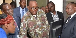 President Uhuru Kenyatta (center) and billionaire Richard Ngatia (left) during a past inspection.