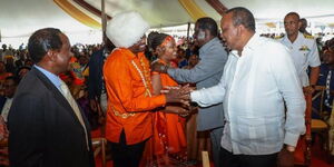 President Uhuru Kenyatta (in white) during the wedding of Kirinyaga Governor Anne Waiguru.