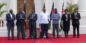 President Uhuru Kenyatta (in white) with other political leaders during an address at State House on Thursday, February 25, 2021.