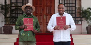 President Uhuru Kenyatta and former Prime Minister Raila Odinga display copies of the report after its presentation by the Building Bridges Initiative at Kisii State Lodge. October 21, 2020.