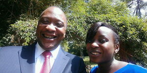 President Uhuru Kenyatta and media personality Jacque Maribe take a selfie at State House in 2014