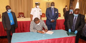 President Uhuru Kenyatta awards Presbyterian University of East Africa a charter at State House on Wednesday, December 2, 2020.