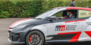 President Uhuru Kenyatta drives a Safari Rally car at State House on Thursday, June 17, 2021.