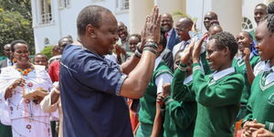 President Uhuru Kenyatta interacting with a student of Nyiro Girls’ Secondary School from Baragoi (Samburu County) at State House, Nairobi on Friday, November 1, 2019