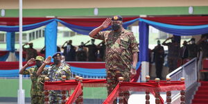 President Uhuru Kenyatta salutes during a past function