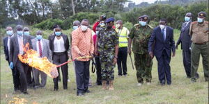 President Uhuru Kenyatta sets 5,144 guns ablaze at the Regional Police Traffic Training Centre in Ngong, Kajiado County.