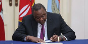 President Uhuru Kenyatta signs deals at State House