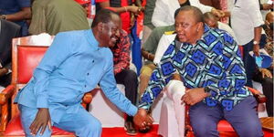 Former President Uhuru Kenyatta with ODM Party Leader Raila Odinga during the coalition's National Delegates Conference at the Kenyatta International Convention Centre in Nairobi on March 12, 2022.