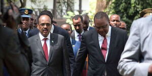 President Uhuru Kenyatta with his Somalia counterpart Mohamed Abdullahi Farmajo after the National Prayer Breakfast at Safari Park hotel in Nairobi on May 31, 2018.