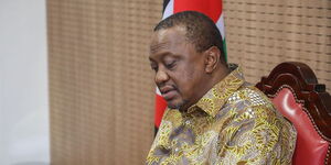President Uhuru taking notes during the video conference meeting held with IGAD members state leaders on March 30, 2020.