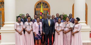 President William Ruto (fourth right), his wife Rachel (third right) and Zabron singers at State House.