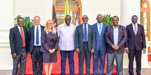President William Ruto (in white shirt) IMF Director for African Department Abebe Aemro Selassie (fourth right ) during a meeting at State House on Saturday, November 5, 2022