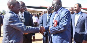 President-elect William Ruto (left) greets former Education CS George Magoha at a past function.
