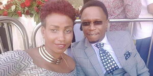 Sports CS Ababu Namwamba (right) and his former wife pose for a photo at Kasarani National Stadium on November 28, 2017.