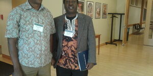 Prof. Iribe Mwangi, Chairman of the Department of Kiswahili and Prof. Mungai Mutonya from Washington University pose for a photo at a Kiswahili Conference held in Yale University.