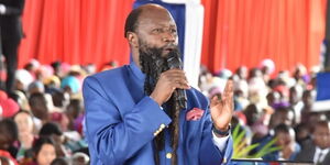 Prophet Owuor addresses a gathering at a conference in Utawala, Nairobi in November 2019